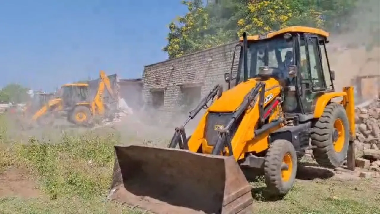 Bulldozer action on hostel building in Neemuch.